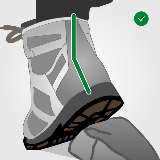 Grauer Kuenzli Schuh auf Felsen, zeigt stabilen Halt und robustes Design.